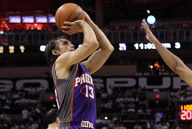 SAN ANTONIO - MAY 07:  Guard Steve Nash #13 of the Phoenix Suns takes a shot against the San Antonio Spurs in Game Three of the Western Conference Semifinals during the 2010 NBA Playoffs at AT&T Center on May 7, 2010 in San Antonio, Texas. NOTE TO USER: User expressly acknowledges and agrees that, by downloading and or using this photograph, User is consenting to the terms and conditions of the Getty Images License Agreement.  (Photo by Ronald Martinez/Getty Images)