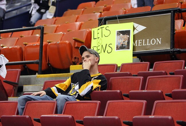 PITTSBURGH - MAY 12:  A Penguins fan sits in the stands after the Montreal Canadiens and Pittsburgh Penguins played what was the final game in the Mellon Arena in Game Seven of the Eastern Conference Semifinals during the 2010 Stanley Cup Playoffs at Mellon Arena on May 12, 2010 in Pittsburgh, Pennsylvania. The Canadiens defeated the Penguins 5-2 to win the series 4-3 and advance to the Conference Finals.  (Photo by Dave Sandford/Getty Images)