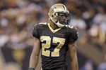 NEW ORLEANS - DECEMBER 27:  Malcolm Jenkins #27 of the New Orleans Saints walks on the field during the game against the Tampa Bay Buccaneers on December 27, 2009 at Louisiana Superdome in New Orleans, Louisiana. (Photo by Jamie Squire/Getty Images)