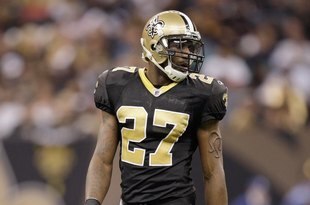 NEW ORLEANS - DECEMBER 27:  Malcolm Jenkins #27 of the New Orleans Saints walks on the field during the game against the Tampa Bay Buccaneers on December 27, 2009 at Louisiana Superdome in New Orleans, Louisiana. (Photo by Jamie Squire/Getty Images)