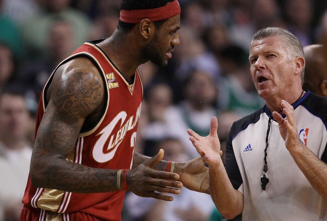 BOSTON - MAY 13:  LeBron James #23 of the Cleveland Cavaliers discusses a call with a referee in the first half against the Boston Celtics during Game Six of the Eastern Conference Semifinals of the 2010 NBA playoffs at TD Garden on May 13, 2010 in Boston, Massachusetts.  NOTE TO USER: User Expressly Acknowledges and agrees that, by downloading and or using this photograph, User is consenting to the terms and conditions of the Getty Images License Agreement.  (Photo by Elsa/Getty Images)