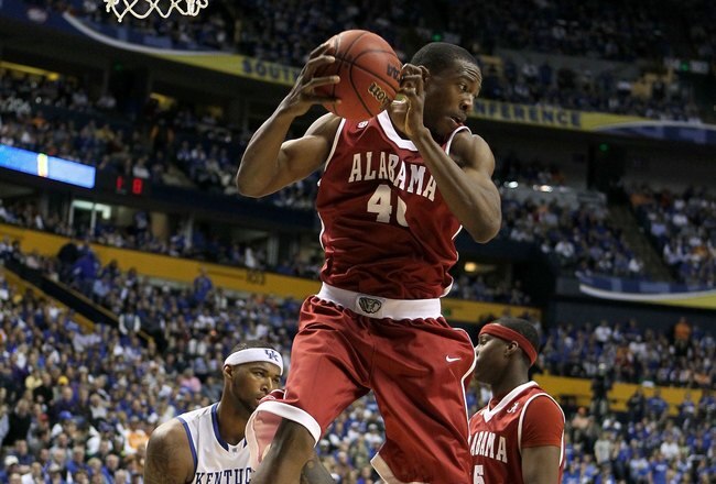 NASHVILLE, TN - MARCH 12:  Justin Knox #40 of the Alabama Crimson Tide controls a rebound against the Kentucky Wildcats  during the quarterfinals of the SEC Men's Basketball Tournament at the Bridgestone Arena on March 12, 2010 in Nashville, Tennessee.  (Photo by Andy Lyons/Getty Images)