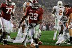 PASADENA, CA - JANUARY 07:  Running back Mark Ingram #22 of the Alabama Crimson Tide celebrates after scoring in the fourth quarter against the Texas Longhorns during the Citi BCS National Championship game at the Rose Bowl on January 7, 2010 in Pasadena, California.  (Photo by Kevork Djansezian/Getty Images)