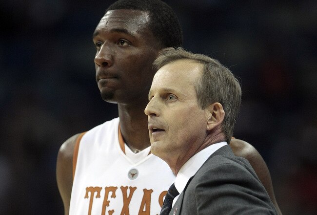 NEW ORLEANS - MARCH 18: Coach Rick Barnes of the Texas Longhorns talks with player Jordan Hamilton #23 near the end of an 81-80 loss to the Wake Forest Demon Deacons during the first round of the 2010 NCAA mens basketball tournament at the New Orleans Arena on March 18, 2010 in New Orleans, Louisiana.  (Photo by Dave Martin/Getty Images)