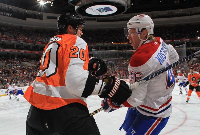 PHILADELPHIA - APRIL 02: Andrei Kostitsyn #46 of the Montreal Canadiens tangles with Chris Pronger #20 of the Philadelphia Flyers at the Wachovia Center on April 2, 2010 in Philadelphia, Pennsylvania. The Canadiens shut out the Flyers 1-0. (Photo by Bruce Bennett/Getty Images)