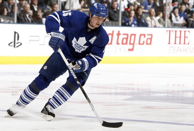 TORONTO - APRIL 6: Tomas Kaberle #15 of the Toronto Maple Leafs moves the puck during a NHL game against the Philadelphia Flyers at the Air Canada Centre on April 6, 2010 in Toronto, Ontario, Canada. (Photo by Abelimages/Getty Images)