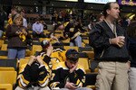 BOSTON - MAY 14:  Boston Bruins fans react after their team lost to the Philadelphia Flyers in Game Seven of the Eastern Conference Semifinals during the 2010 NHL Stanley Cup Playoffs at TD Garden on May 14, 2010 in Boston, Massachusetts. The Flyers defeated the Bruins 4-3.  (Photo by Elsa/Getty Images)