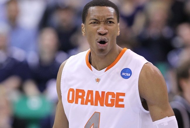 SALT LAKE CITY - MARCH 25:  Wesley Johnson #4 of the Syracuse Orange in action against the Butler Bulldogs during the west regional semifinal of the 2010 NCAA men's basketball tournament at the Energy Solutions Arena on March 25, 2010 in Salt Lake City, Utah.  (Photo by Jed Jacobsohn/Getty Images)