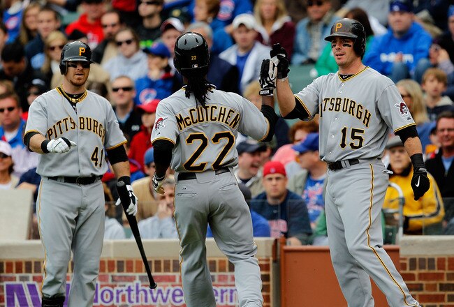 CHICAGO - MAY 15: Ryan Doumit #41 and Andy LaRoche #15 of the Pittsburgh Pirates greet teammate Andrew McCutchen #22 after McCutchen scored a run in the 1st inning against the Chicago Cubs at Wrigley Field on May 15, 2010 in Chicago, Illinois. The Pirates defeated the Cubs 4-3. (Photo by Jonathan Daniel/Getty Images)