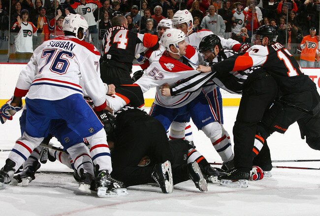 PHILADELPHIA - FEBRUARY 12: The Philadelphia Flyers and the Montreal Canadiens exchange blows after the game had ended on February 12, 2010 at the Wachovia Center in Philadelphia, Pennsylvania. Flyers defeated the Canadiens 3-2. (Photo by Mike Stobe/Getty Images)
