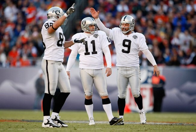 DENVER - DECEMBER 20:  (L-R) Brandon Meyers #83, Sebastian Janikowski #11 and Shane Lechler #9 of the Oakland Raiders celebrate a 54 yard field goal by Janikowski in the second quarter against the Denver Broncos at Invesco Field at Mile High on December 20, 2009 in Denver, Colorado.  (Photo by Jeff Gross/Getty Images)
