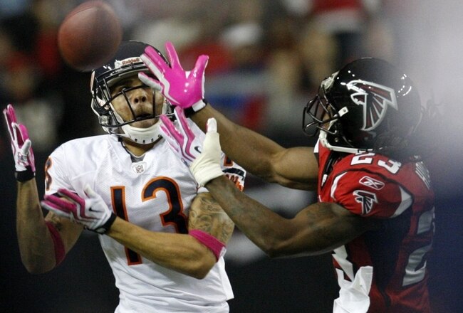 ATLANTA - OCTOBER 18: Center back Chris Houston #23 of the Atlanta Falcons breaks up a pass tended for wide receiver Johnny Knox #13 of the Chicago Bears in the second quarter of the game at the Georgia Dome on October 18, 2009 in Atlanta, Georgia. (Photo by Kevin C. Cox/Getty Images)