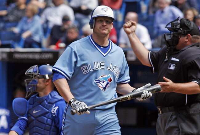 TORONTO - APRIL 21: Lyle Overbay #35 of the Toronto Blue Jays playing in his 1000th game strikes out against the Kansas City Royals during a MLB game at the Rogers Centre April 21, 2010 in Toronto, Ontario, Canada. (Photo by Abelimages / Getty Images)