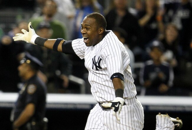 NEW YORK - MAY 17:  Marcus Thames #38 of the New York Yankees celebrates his two-run walk off home run in the ninth inning to beat the Boston Red Sox on May 17, 2010 at Yankee Stadium in the Bronx borough of New York City. The Yankees defeated the Red Sox 11-9.  (Photo by Chris Trotman/Getty Images)