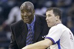 CHARLOTTE, NC - NOVEMBER 18:  Head coach Paul Silas of the Cleveland Cavaliers confers with official Tim Donaghy #21 during an NBA game against the Charlotte Bobcats on November 18, 2004 at the Charlotte Coliseum in Charlotte, North Carolina.  The Cavaliers won the game 106-89.  NOTE TO USER: User expressly acknowledges and agrees that, by downloading and/or using this Photograph, user is consenting to the terms and conditions of the Getty Images License Agreement.  (Photo By Grant Halverson/Getty Images)