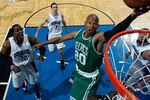 ORLANDO, FL - MAY 16:  Ray Allen #20 of the Boston Celtics drives for a shot attempt against the Orlando Magic in Game One of the Eastern Conference Finals during the 2010 NBA Playoffs at Amway Arena on May 16, 2010 in Orlando, Florida.  NOTE TO USER: User expressly acknowledges and agrees that, by downloading and/or using this Photograph, user is consenting to the terms and conditions of the Getty Images License Agreement.  (Photo by Gary Green-Pool/Getty Images)