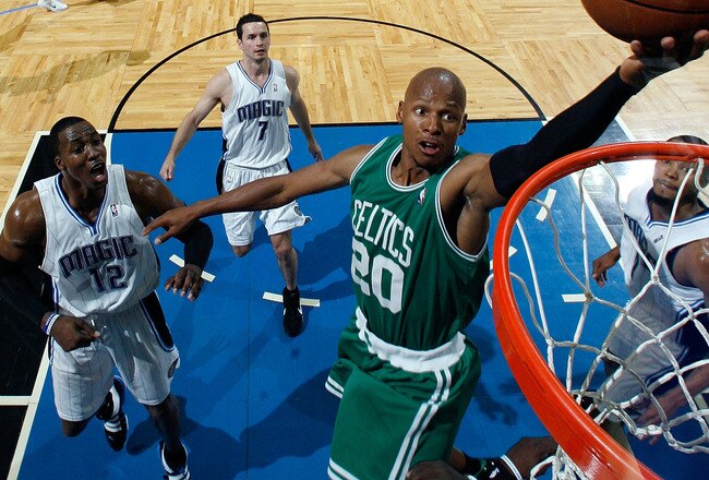 ORLANDO, FL - MAY 16:  Ray Allen #20 of the Boston Celtics drives for a shot attempt against the Orlando Magic in Game One of the Eastern Conference Finals during the 2010 NBA Playoffs at Amway Arena on May 16, 2010 in Orlando, Florida.  NOTE TO USER: User expressly acknowledges and agrees that, by downloading and/or using this Photograph, user is consenting to the terms and conditions of the Getty Images License Agreement.  (Photo by Gary Green-Pool/Getty Images)
