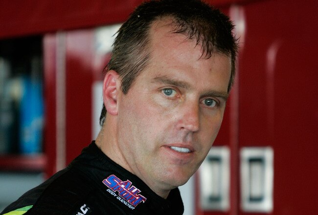 TALLADEGA, AL - APRIL 24:  Jeremy Mayfield, driver of the #41 All Sport Body Quencher Toyota, waits in the garage area during practice for the NASCAR Sprint Cup Series Aaron's 499 at Talladega Superspeedway on April 24, 2009 in Talladega, Alabama.  (Photo by Jerry Markland/Getty Images for NASCAR)
