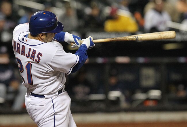 NEW YORK - MAY 11: Rod Barajas #21 of the New York Mets hits a 2 RBI double in the eighth inning against the Washington Nationals at Citi Field on May 11, 2010 in the Flushing neighborhood of the Queens borough of New York City.  (Photo by Nick Laham/Getty Images)