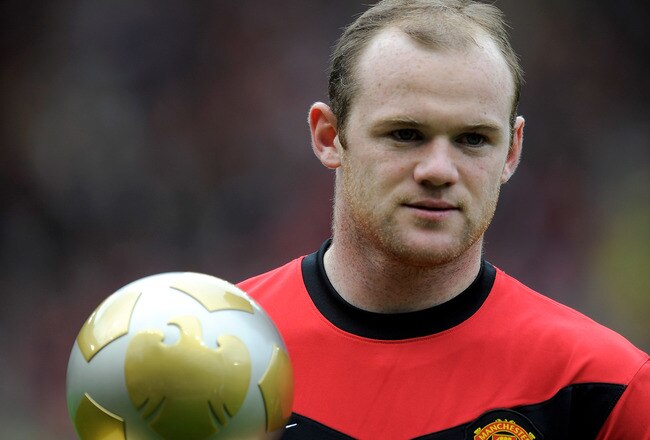 MANCHESTER, ENGLAND - MAY 09:  Wayne Rooney of Manchester United poses with the Barclays Player of the season award prior to the Barclays Premier League match between Manchester United and Stoke City at Old Trafford on May 9, 2010 in Manchester, England. (Photo by Michael Regan/Getty Images)