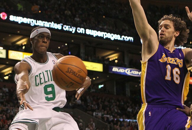 BOSTON - JANUARY 31:  Rajon Rondo #9 of the Boston Celtics gets by Pau Gasol #16 of the Los Angeles Lakers at the TD Garden on January 31, 2010 in Boston, Massachusetts.  NOTE TO USER: User expressly acknowledges and agrees that, by downloading and or using this photograph, User is consenting to the terms and conditions of the Getty Images License Agreement. (Photo by Jim Rogash /Getty Images)
