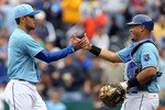 KANSAS CITY, MO - MAY 13:  Pitcher Joakim Soria #48 of the Kansas City Royals is congratulated by catcher Brayan Pena #27 after the Royals defeated the Cleveland Indians 6-4 to win the game on May 13, 2010 at Kauffman Stadium in Kansas City, Missouri.  (Photo by Jamie Squire/Getty Images)
