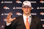 ENGLEWOOD, CO - APRIL 23:  Tim Tebow is introduced by the Denver Broncos at a press conference at the Broncos Headquarters in Dove Valley on April 23, 2010 in Englewood, Colorado. The Broncos picked Tebow in the first round of the 2010 NFL draft.  (Photo by Doug Pensinger/Getty Images)