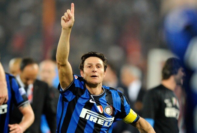 ROME - MAY 05:  Javier Zanetti (R) of Inter Milan celebrates after the Tim Cup final between FC Internazionale Milano and AS Roma at Stadio Olimpico on May 5, 2010 in Rome, Italy.  (Photo by Claudio Villa/Getty Images)