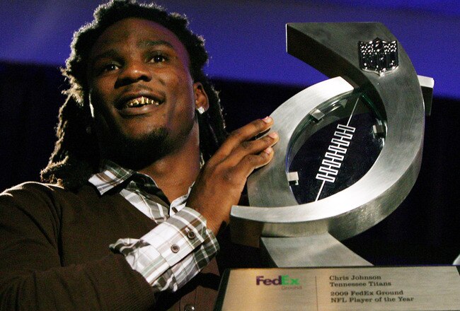 FORT LAUDERDALE, FL - FEBRUARY 03:  Chris Johnson #28 of the Tennessee Titans smiles with his award after being named the FedEx Ground NFL Player of the Year at a press conference held at the Fort Lauderdale Convention Center as part of media week for Super Bowl XLIV on February 3, 2010 in Fort Lauderdale, Florida.  (Photo by Doug Benc/Getty Images)