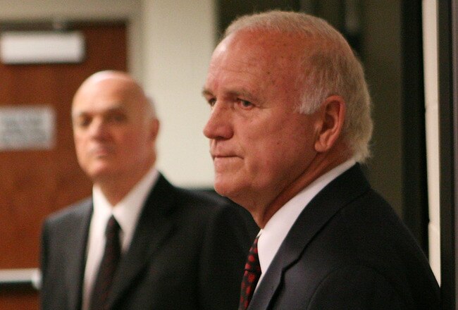 NEWARK, NJ - APRIL 26:  With New Jersey Devils team president Lou Lamoriello (L) by his side, head coach Jacques Lemaire (R) announces his retirement at the Prudential Center on April 26, 2010 in Newark, New Jersey.  (Photo by Bruce Bennett/Getty Images)