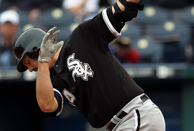 KANSAS CITY, MO - MAY 16:  Paul Konerko #14 of the Chicago White Sox swings for a strike during the game against the Kansas City Royals on May 16, 2010 at Kauffman Stadium in Kansas City, Missouri.  (Photo by Jamie Squire/Getty Images)