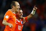 BERNE, SWITZERLAND - JUNE 13:  Wesley Sneijder of Netherlands celebrates with Arjen Robben after scoring his teams fourth goal during the UEFA EURO 2008 Group C match between Netherlands and France at Stade de Suisse Wankdorf on June 13, 2008 in Berne, Switzerland.  (Photo by Ian Walton/Getty Images)