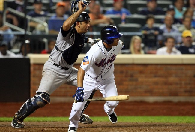 NEW YORK - JUNE 28:  Argenis Reyes #11 of the New York Mets bats against the New York Yankees on June 28, 2009 at Citi Field in the Flushing neighborhood of the Queens borough of New York City. The Yankees defeated the Mets 4-2.  (Photo by Jim McIsaac/Getty Images)
