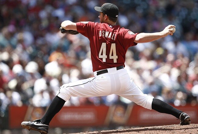 HOUSTON - APRIL 11:  Pitcher Roy Oswalt #44 of the Houston Astros pitches against the Philadelphia Phillies at Minute Maid Park on April 11, 2010 in Houston, Texas.  (Photo by Bob Levey/Getty Images)