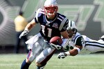 EAST RUTHERFORD, NJ - SEPTEMBER 20: Dwight Lowery #21 of the New York Jets attempts to tackle Julian Edelman #11 of the New England Patriots at Giants Stadium on September 20, 2009 in East Rutherford, New Jersey.  (Photo by Nick Laham/Getty Images)