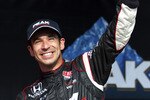 INDIANAPOLIS - MAY 22:  Helio Castroneves of Brazil driver of the #3 Team Penske Dallara Honda celebrates after earning pole position during Pole Day qualifying for the IZOD IndyCar Series 94th running of the Indianapolis 500 at the Indianapolis Motor Speedway on May 22, 2010 in Indianapolis, Indiana.  (Photo by Robert Laberge/Getty Images)
