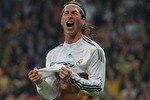 MADRID, SPAIN - MAY 08:  Sergio Ramos of Real Madrid celebrates scoring during the La Liga match between Real Madrid and Athletic Bilbao at the Estadio Santiago Bernabeu on May 8, 2010 in Madrid, Spain. Real Madrid won the match 5-1.  (Photo by Jasper Juinen/Getty Images)