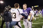SEATTLE - DECEMBER 05:  Quarterback Jake Locker #10 of the Washington Huskies is congratulated by Kevin Riley #13 of the California Bears after the game on December 5, 2009 at Husky Stadium in Seattle, Washington. The Huskies defeated the Bears 42-10. (Photo by Otto Greule Jr/Getty Images)