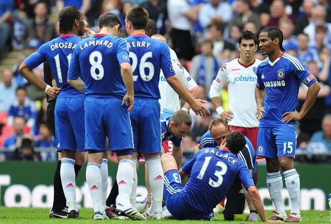 LONDON, ENGLAND - MAY 15:  Michael Ballack of Chelsea lies injured during the FA Cup sponsored by E.ON Final match between Chelsea and Portsmouth at Wembley Stadium on May 15, 2010 in London, England.  (Photo by Clive Mason/Getty Images)