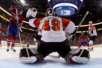 MONTREAL, QC - MAY 22:  Michael Leighton #49 of the Philadelphia Flyers makes a save against the Montreal Canadiens in Game 4 of the Eastern Conference Finals during the 2010 NHL Stanley Cup Playoffs at Bell Centre on May 22, 2010 in Montreal, Canada.  (Photo by Dave Sandford/Getty Images)