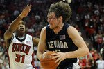 LAS VEGAS - NOVEMBER 18:  Luke Babbitt #5 of the Nevada Reno Wolf Pack drives against Justin Hawkins #31 of the UNLV Rebels during their game at the Thomas & Mack Center November 18, 2009 in Las Vegas, Nevada. UNLV won 88-75.  (Photo by Ethan Miller/Getty Images)
