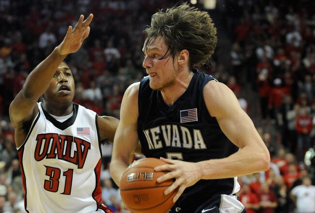 LAS VEGAS - NOVEMBER 18:  Luke Babbitt #5 of the Nevada Reno Wolf Pack drives against Justin Hawkins #31 of the UNLV Rebels during their game at the Thomas & Mack Center November 18, 2009 in Las Vegas, Nevada. UNLV won 88-75.  (Photo by Ethan Miller/Getty Images)