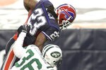 TORONTO - DECEMBER 3: Marshawn Lynch #23 of the Buffalo Bills scores a 15-yard rushing touchdown in the second quarter against Jim Leonhard #36 of the New York Jets at Rogers Centre on December 3, 2009 in Toronto, Canada.  (Photo by Rick Stewart/Getty Images)