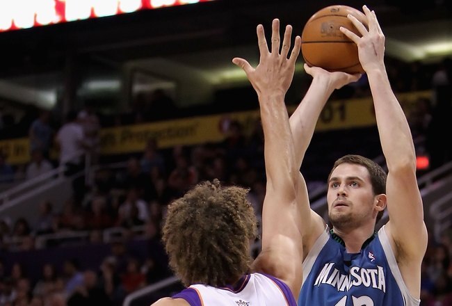 PHOENIX - MARCH 16:  Kevin Love #42 of the Minnesota Timberwolves puts up a shot during the NBA game against the Phoenix Suns at US Airways Center on March 16, 2010 in Phoenix, Arizona. The Suns defeated the Timberwolves 152-114.  NOTE TO USER: User expressly acknowledges and agrees that, by downloading and or using this photograph, User is consenting to the terms and conditions of the Getty Images License Agreement.  (Photo by Christian Petersen/Getty Images)