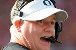 PASADENA, CA - JANUARY 01:  Head coach Chip Kelly of the Oregon Ducks stands on the sidelines during the game against the Ohio State Buckeyes at the 96th Rose Bowl game on January 1, 2010 in Pasadena, California.  (Photo by Harry How/Getty Images)