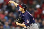 BOSTON - MAY 19:  Scott Baker #30 of the Minnesota Twins delivers a pitch in the first inning against the Boston Red Sox on May 19, 2010 at Fenway Park in Boston, Massachusetts.  (Photo by Elsa/Getty Images)