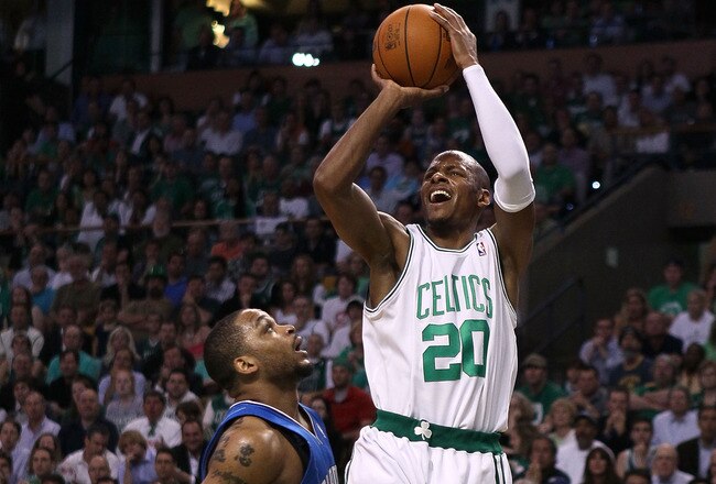 BOSTON - MAY 24:  Ray Allen #20 of the Boston Celtics attempts a shot against Jameer Nelson #14 of the Orlando Magic in Game Four of the Eastern Conference Finals during the 2010 NBA Playoffs at TD Banknorth Garden on May 24, 2010 in Boston, Massachusetts.  NOTE TO USER: User expressly acknowledges and agrees that, by downloading and/or using this Photograph, user is consenting to the terms and conditions of the Getty Images License Agreement.  (Photo by Elsa/Getty Images)