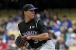 LOS ANGELES, CA - MAY 09:  Ubaldo Jimenez #38 of the Colorado Rockies pitches against the Los Angeles Dodgers in the second inning at Dodger Stadium on May 9, 2010 in Los Angeles, California.  (Photo by Jeff Gross/Getty Images)