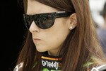 INDIANAPOLIS - MAY 15:  Danica Patrick of Andretti Autosport watches on as her crew readies her car during opening day at the Indianapolis Motor Speedway on May 15, 2010 in Indianapolis, Indiana.   (Photo by Ron Hoskins/Getty Images)