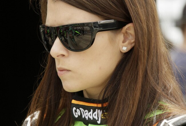 INDIANAPOLIS - MAY 15:  Danica Patrick of Andretti Autosport watches on as her crew readies her car during opening day at the Indianapolis Motor Speedway on May 15, 2010 in Indianapolis, Indiana.   (Photo by Ron Hoskins/Getty Images)